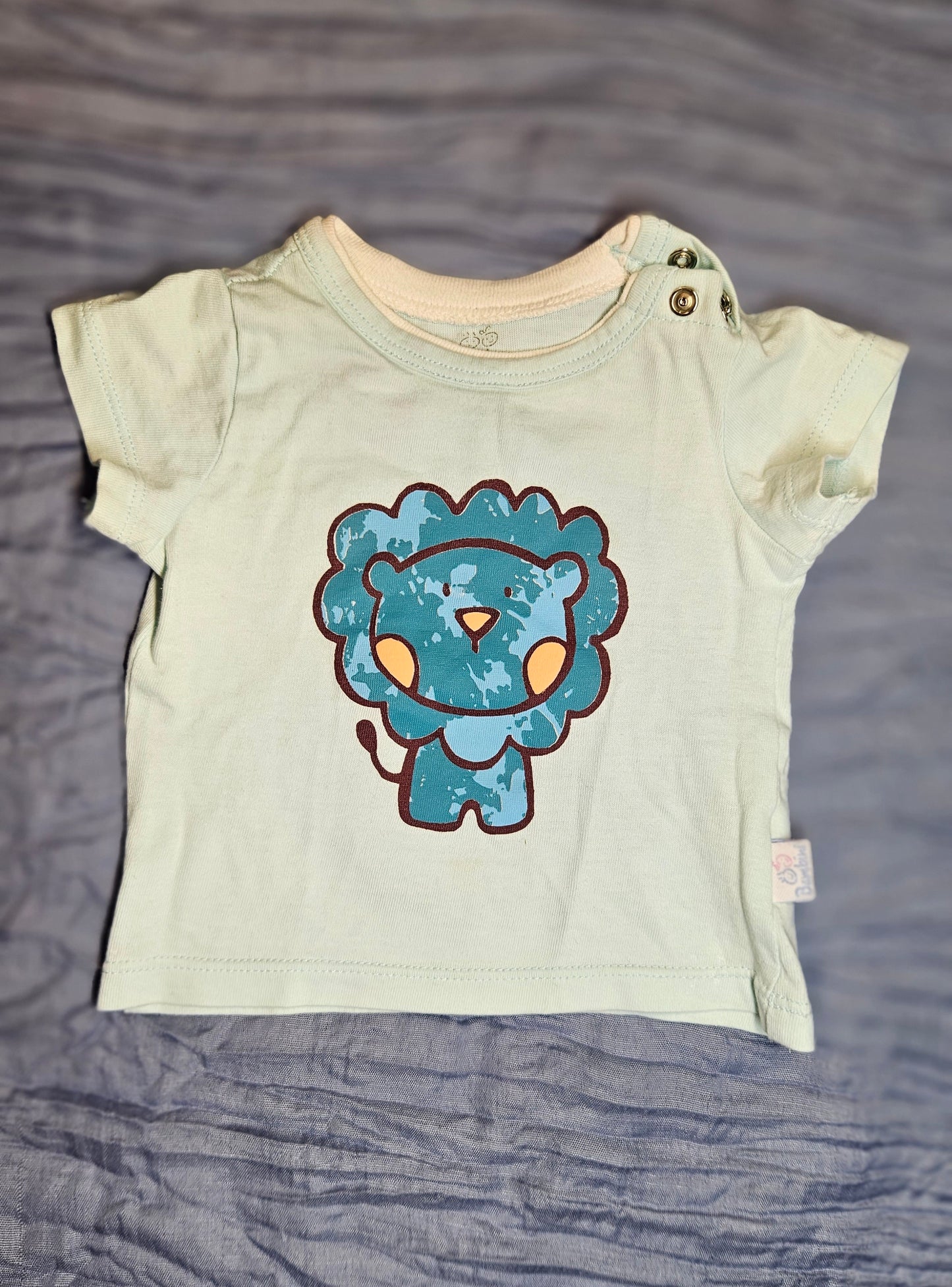 Remera bebé, diseño león azul